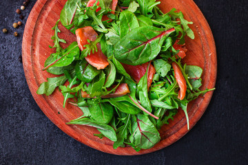 healthy salad leaves mix, salmon or tuna (delicious snack) menu concept. food background. top view. copy space