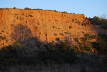 Sunlit Orange Canyon Cliff Front