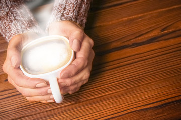 a female hands and coffee
