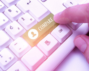 Text sign showing Compare. Business photo text Estimate Measure Note the similarities...