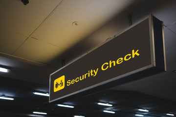 Security check within airport sign.