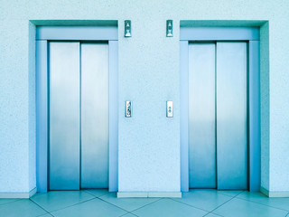 Elevator with two silver door