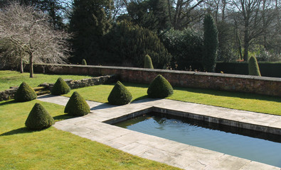 Shaped Topiary Hedges in a Large Formal Garden.