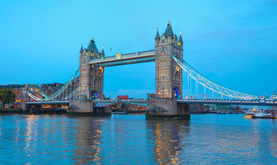 Fototapeta na wymiar Panorama of the Tower Bridge and Tower of London on Thames river at twilight blue hour - London, United Kingdom