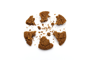 Biscuit with chocolate chip flavored. Some broken and crumbs of crunchy delicious sweet meal and useful cookie with on white background.