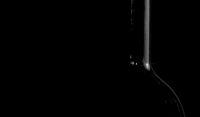 Low key contour of wine bottle with star bust