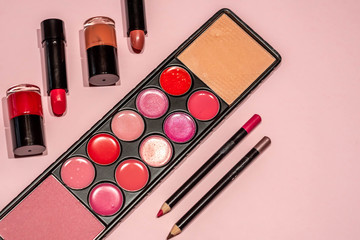 Makeup, lipstick and brushes ready to use