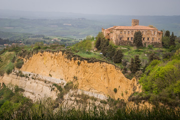 Fototapeta na wymiar Volterra. Balze of Volterra and medieval town of Tuscany