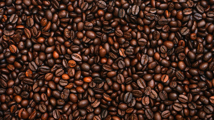 Many brown coffee beans, can be used as a background