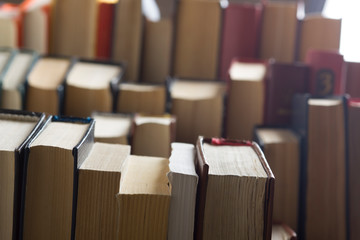 Stack of books background. many books piles.