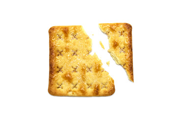 Broken square crackers biscuits isolated on white background. Crushed dry snack.