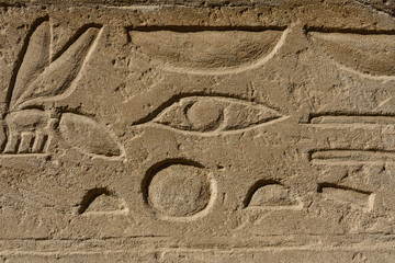 Egyptian ancient hieroglyphs on the stone wall