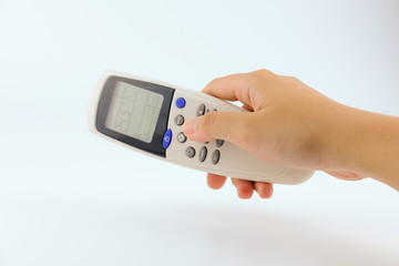 Close up hand women using remote controller open The air conditioner on White Background. Health, Technology and Electronic Equipment concept.