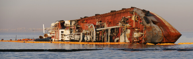 Fototapeta na wymiar Old abandoned ship wrecked near public beach Odessa, Ukraine
