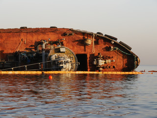 Old abandoned ship wrecked near public beach Odessa, Ukraine