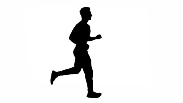 Silhouette of a Muscular Man Running, Super Slow Motion.
