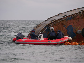 Old abandoned ship wrecked near public beach Odessa, Ukraine
