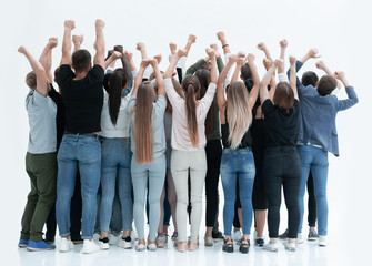 Obraz premium team of happy young people standing with hands up