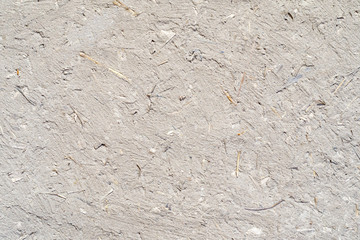 Clay stucco texture with straw. Adobe