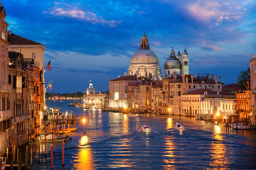 Fototapeta na wymiar View of Venice Grand Canal and Santa Maria della Salute church in the evening