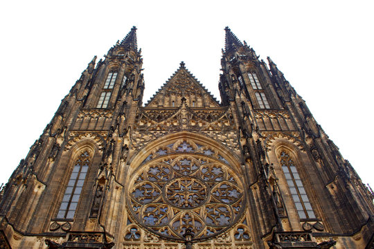 Prague. 05.10.2019: Perspective view of the Metropolitan Cathedral of Saints Vitus, Wenceslaus and Adalbert, an excellent example of Gothic architecture. Golden Gate South Tower with clock.