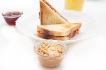 Sandwich with jam and peanut butter, delicious breakfast