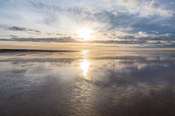 Evening reflections at low tide, at Southport Beach