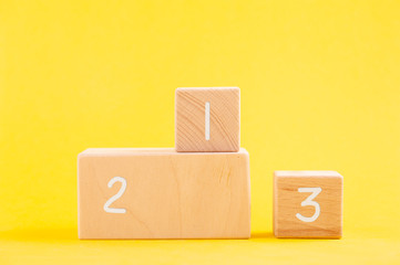 Wooden podium with bricks