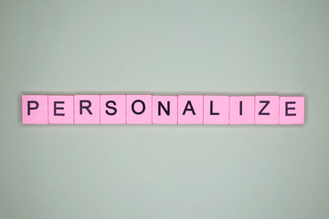 Personalize word wooden cubes on a lite background