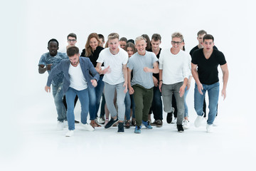 Obraz premium in full growth. smiling young people quickly run forward.