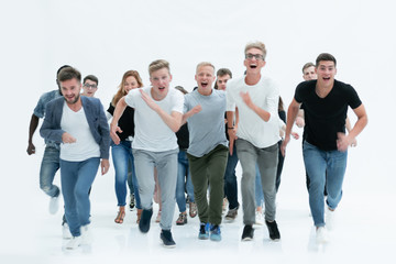 in full growth. smiling young people quickly run forward.