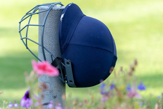 Cricket Helemet Hanging From Post As A Memorial.