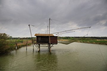 Fototapeta na wymiar Capanno da pesca nel delta del Po