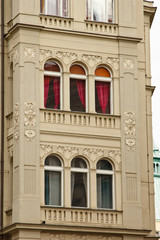 Prague, Czech Republic. 10.05.2019: Close-up view of the facade with windows of old historical buildings in Prague. Retro, old-fashioned, vintage, last century.