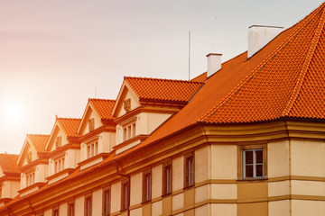 Prague. 05.10.2019: Orange colored roof tops of Prague old town buildings and baroque style houses viewed from top of old town hall tower, Prague, Czech Republic. Panorama.
