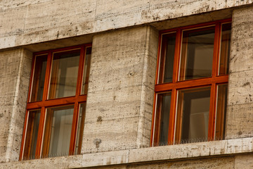 Prague, Czech Republic. 10.05.2019: Close-up view of the facade with windows of old historical buildings in Prague. Retro, old-fashioned, vintage, last century.