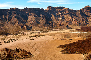 Beautiful aerial view of the canyon, mountains and volcano teide in tenerife national park on a summer sunny day. Canary islands