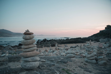 Sunset with stones in balance