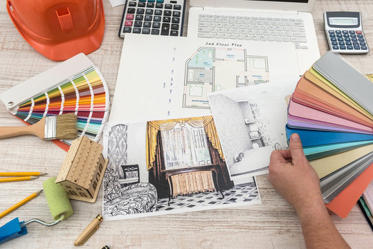 The designer chooses the perfect color for a new apartment. Sketch of a modern apartment.