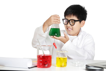 Elementary school boys wear white clothes, doing science experiments in the laboratory. Concept of child education development. isolated