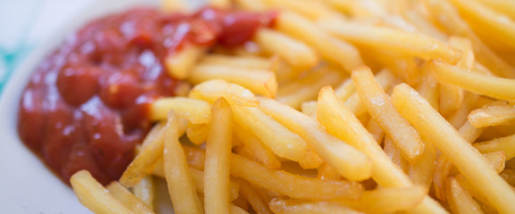 Closeup french fries and ketchup