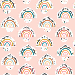 Childish seamless pattern with rainbow. Creative boho kids vector texture for fabric, wrapping paper, textiles, wallpaper, clothing. Trendy background. Hand drawn vector illustration