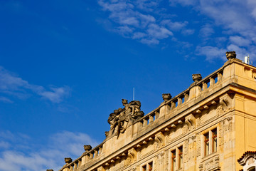 Fototapeta premium Prague, Czech Republic. 10.05.2019: Close-up view of the facade with windows of old historical buildings in Prague. Retro, old-fashioned, vintage, last century.