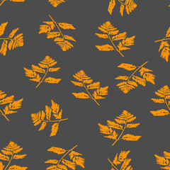 Vector Illustration of orange carved fall leaves isolated on a gray background, Seamless pattern