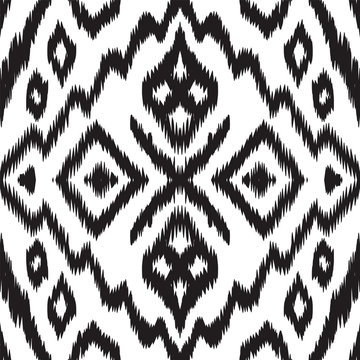 Black and White Arabic Ikat Vector Seamless Pattern. Bohemian Shibori Ethnic Ornament. Aztec Fabric Wallpaper. Black Chevron Japan Vector Seamless Pattern