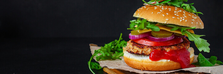 burger, meat cutlet beef steak, tomato, sauce and lettuce (tasty meat snack sandwich) menu concept. food background. top view. copy space