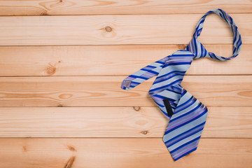 accessories for men. colorful ties on a wooden background. concept of happy father's day or shoppig