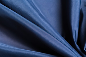 Blue fabric cloth texture. abstract texture background with soft waves.