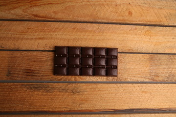 milk chocolate tablet in color background