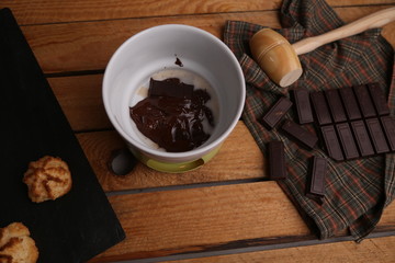 melting chocolate tablet in color background